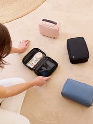 various away accessories packed with toiletries and other travel items