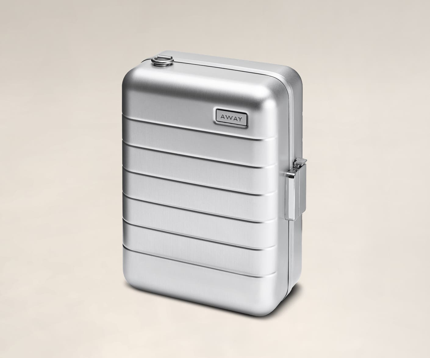 Hardsided mini suitcase displayed from the front in Silver aluminum.