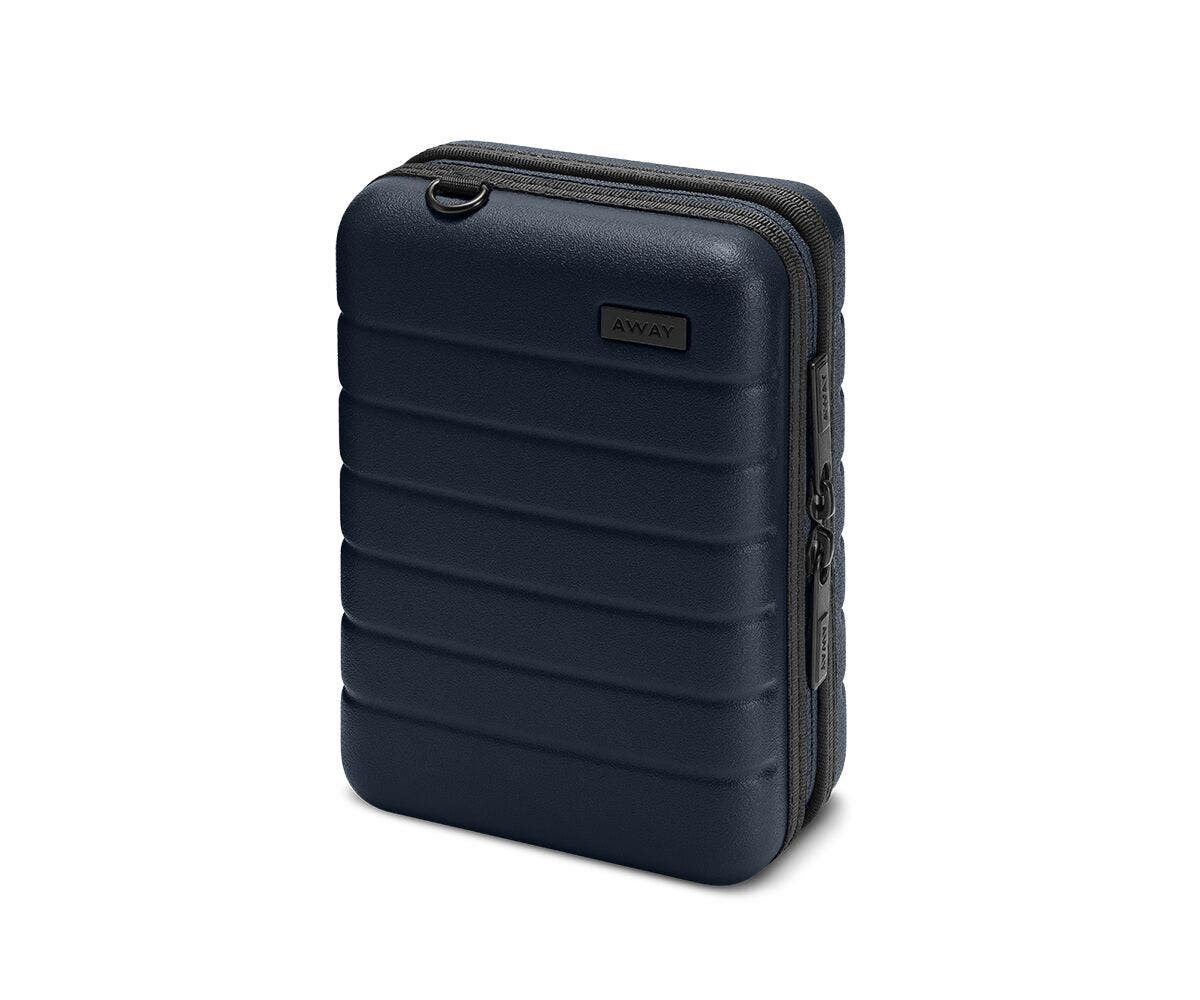 Hardsided mini suitcase displayed from the front in Navy.