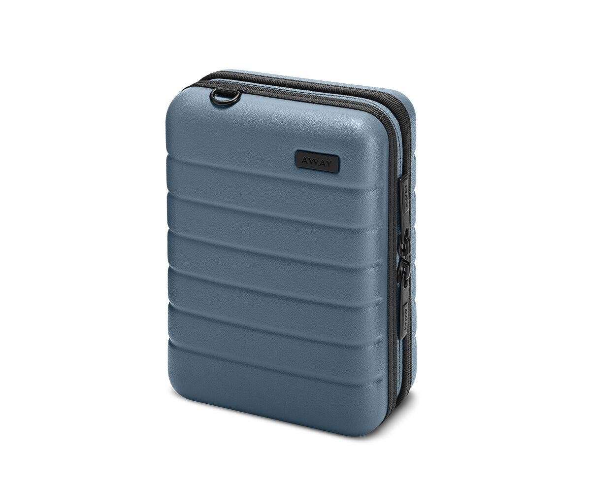 Hardsided mini suitcase displayed from the front in Coast.