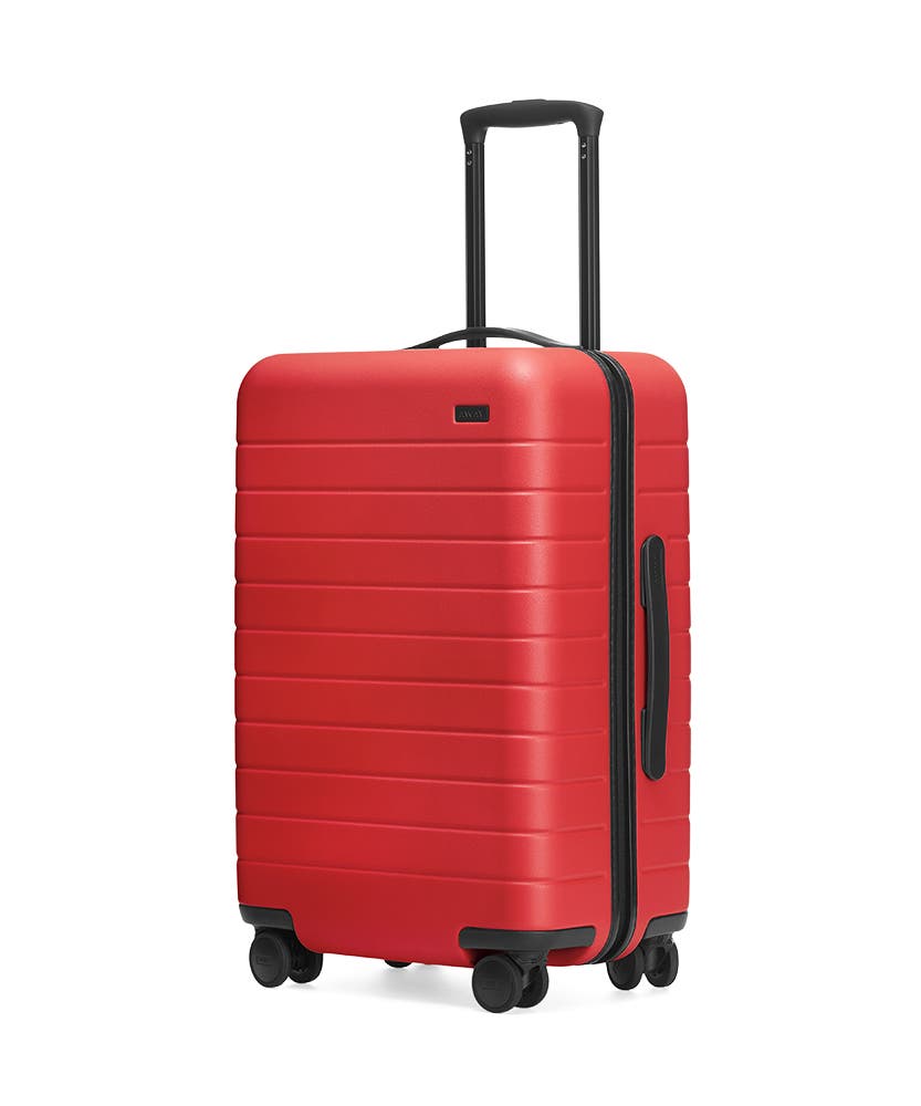 The Cherry Bigger Carry-On hardside with raised telescopic handles shown at an angle.