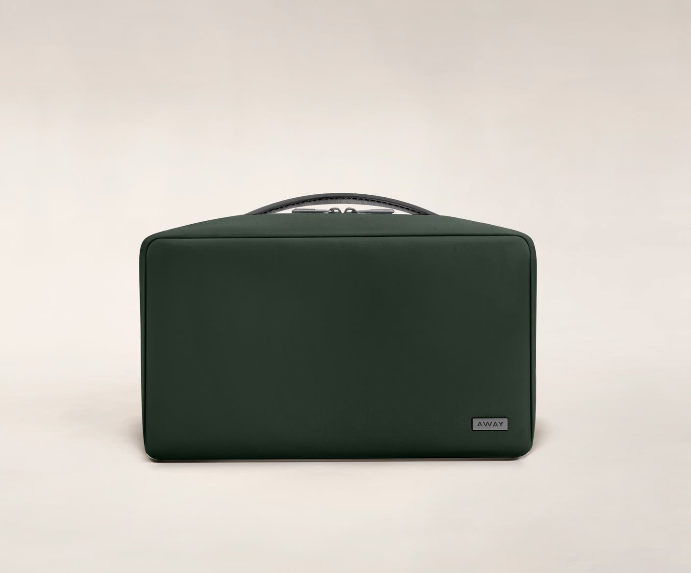 Large travel toiletry bag in the color green.