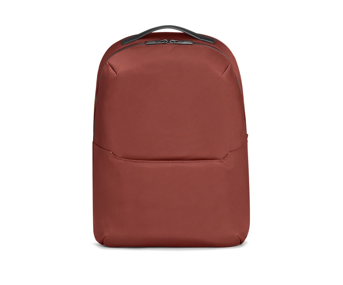 Front view of a red backpack.