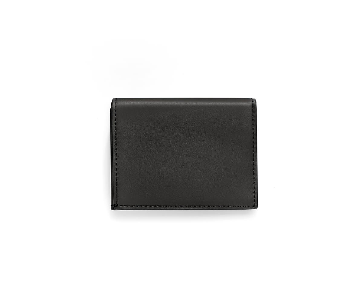 A black L-Fold wallet for travel.