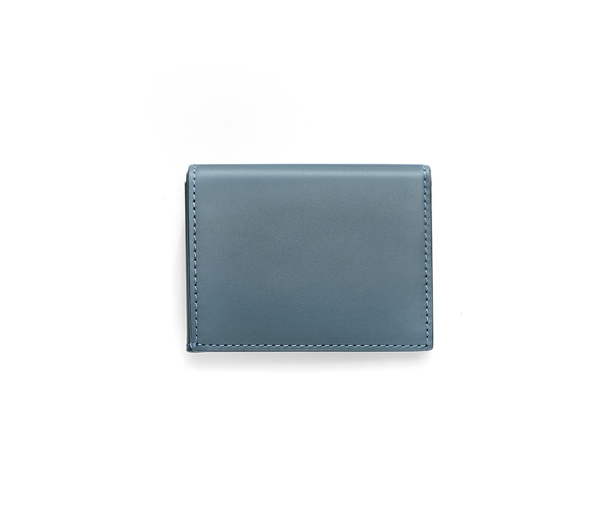 A coast L-Fold wallet for travel.