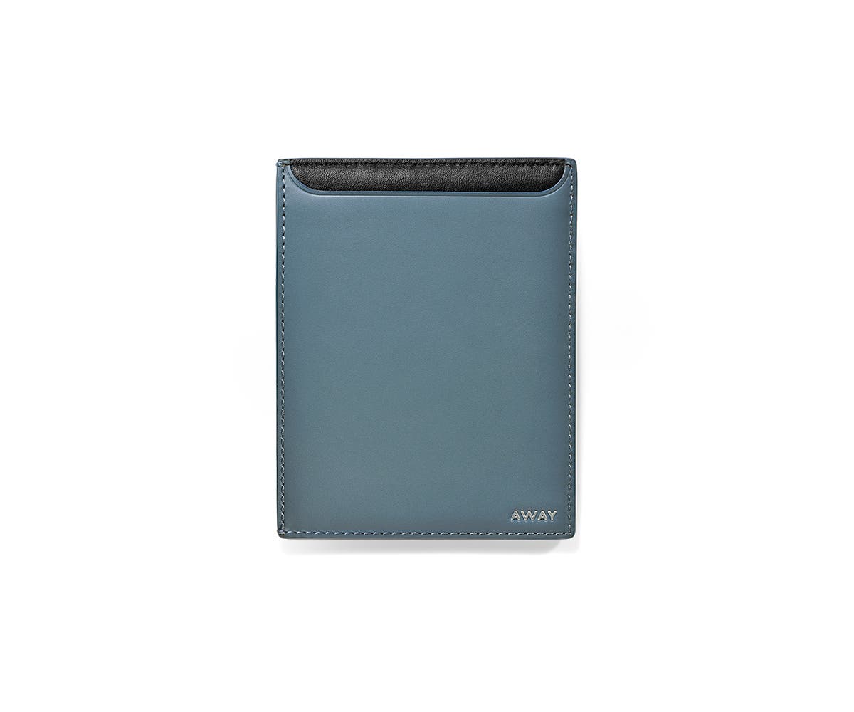 A back view of a coast passport holder.