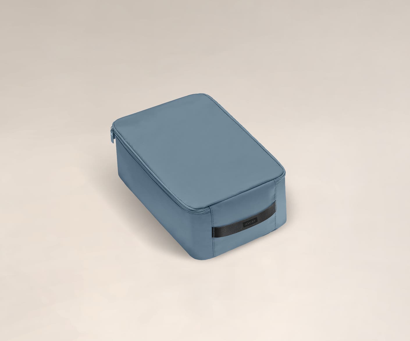 A angled view of a small coast shoe cube.