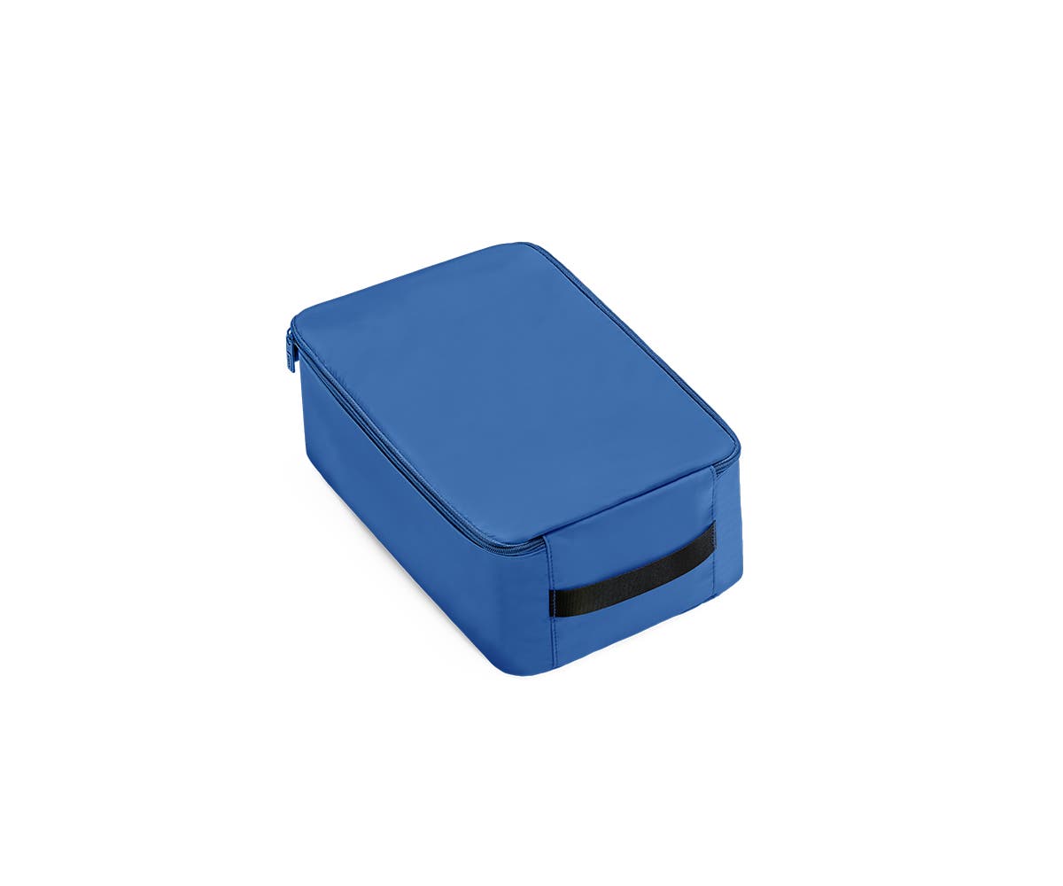 A angled view of a small nightfall blue shoe cube.