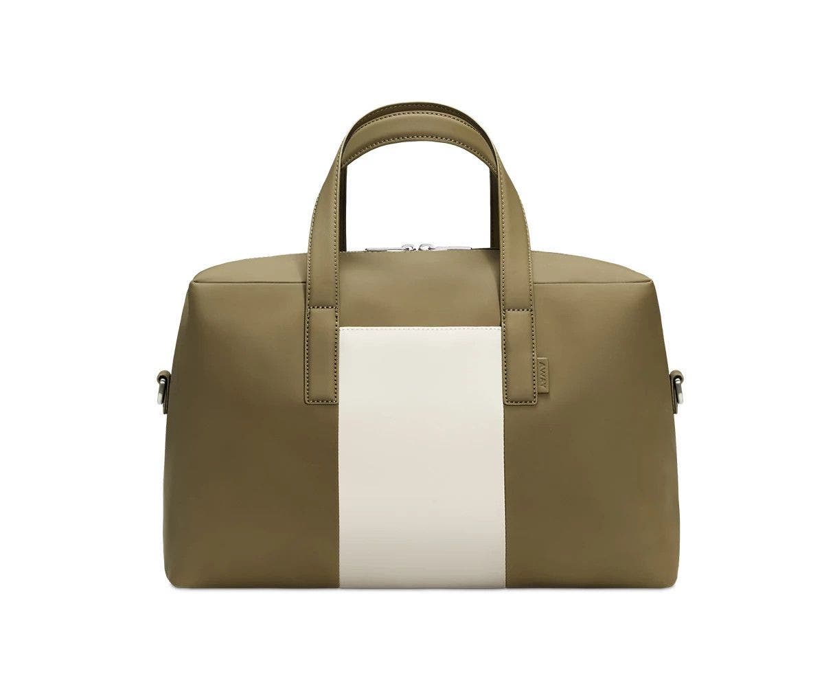 Front of a Coast/Navy duffle bag with raised straps.