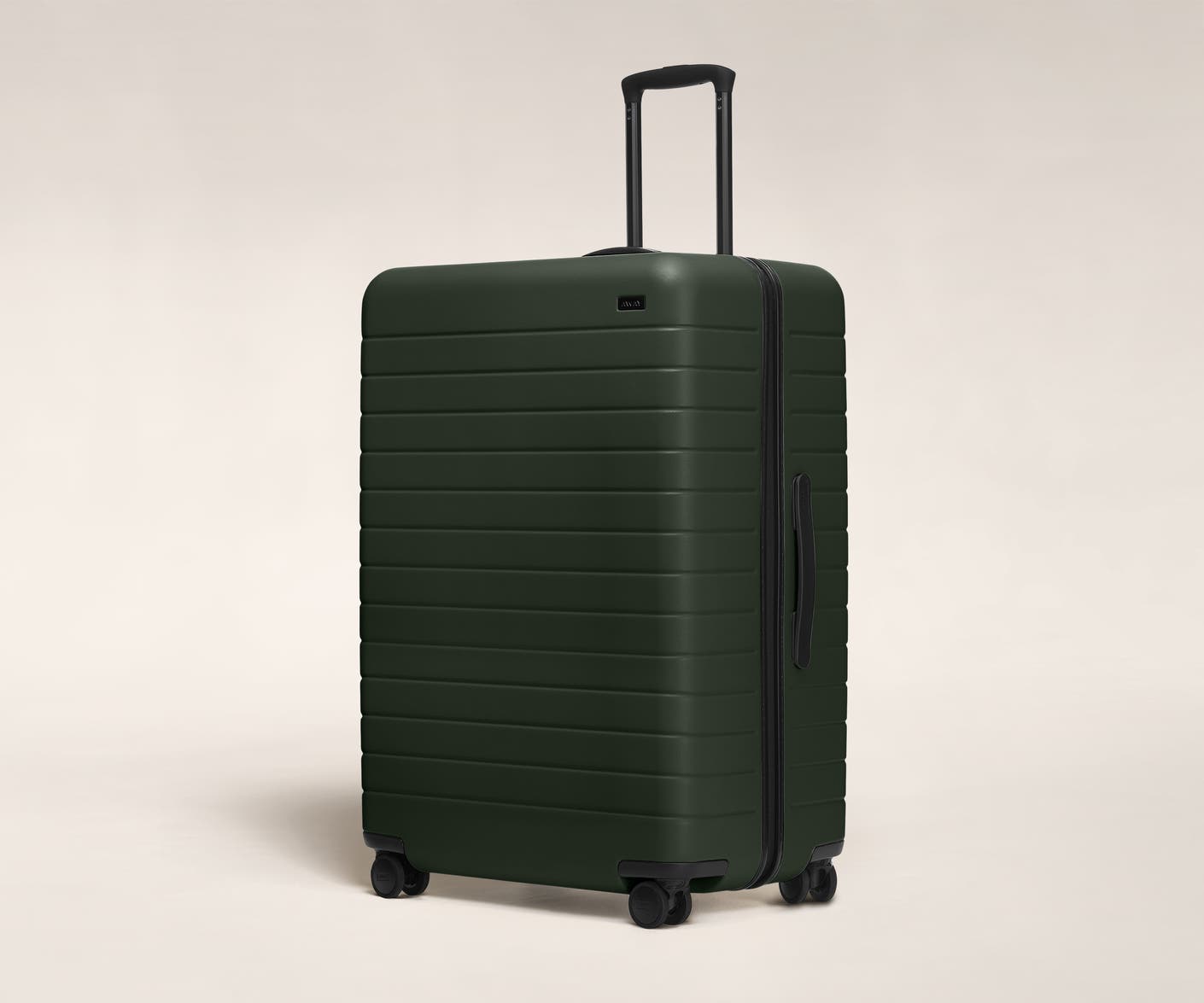 The Large in Green shown at an angle with raised telescoping handle