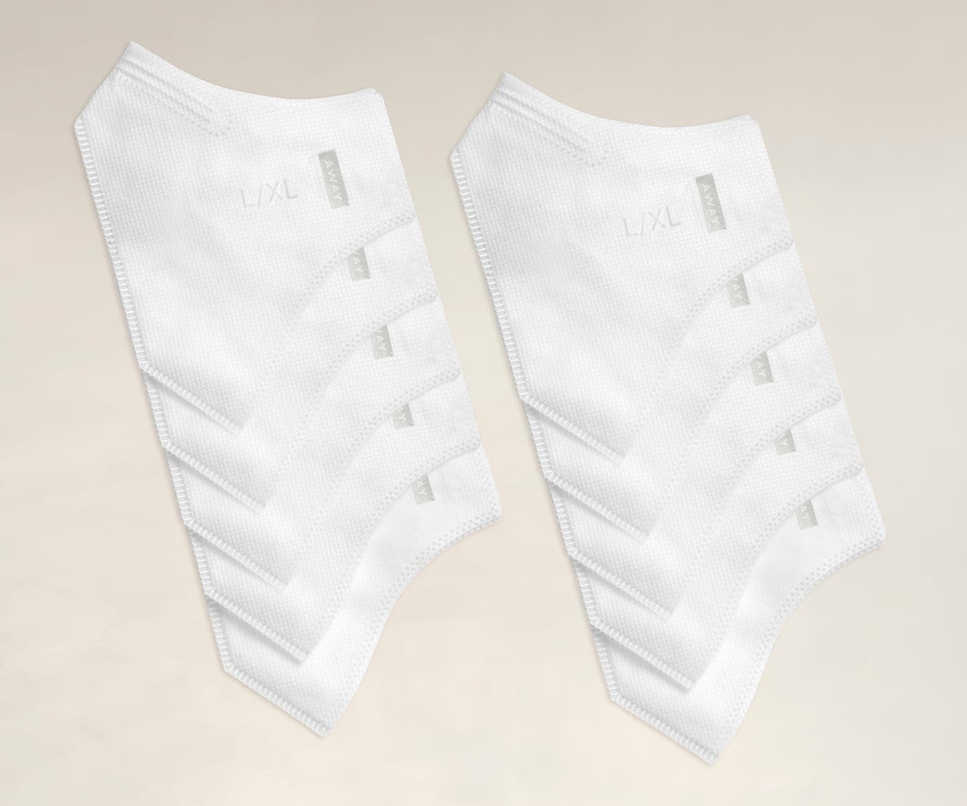 Two packs of white replacement filters for reusable cloth face mask inserts.