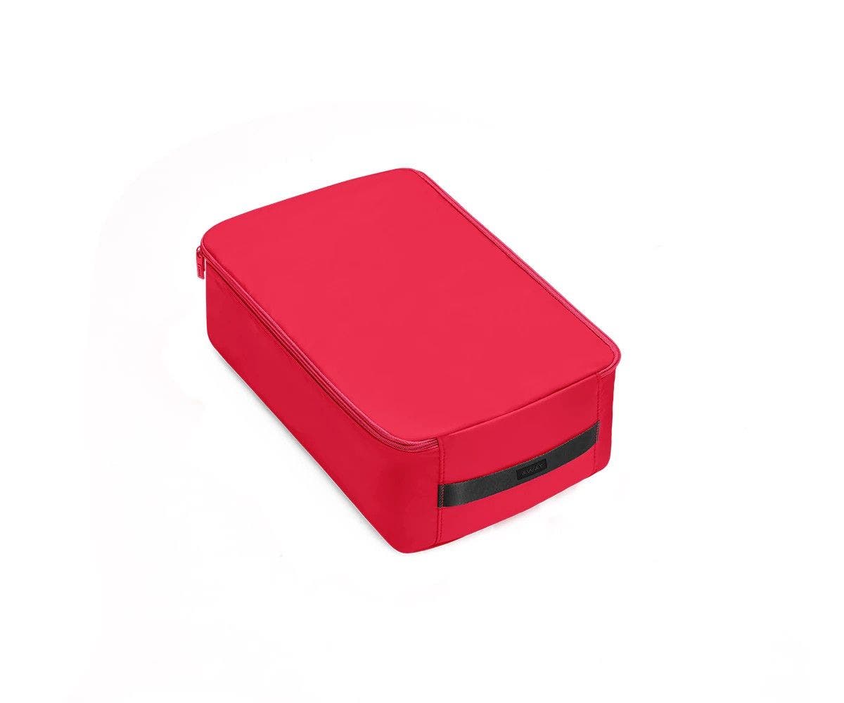 A large electric magenta shoe cube