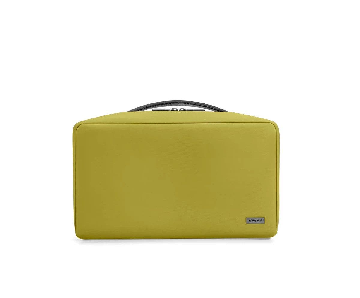 Large travel toiletry bag in the color pistachio green.