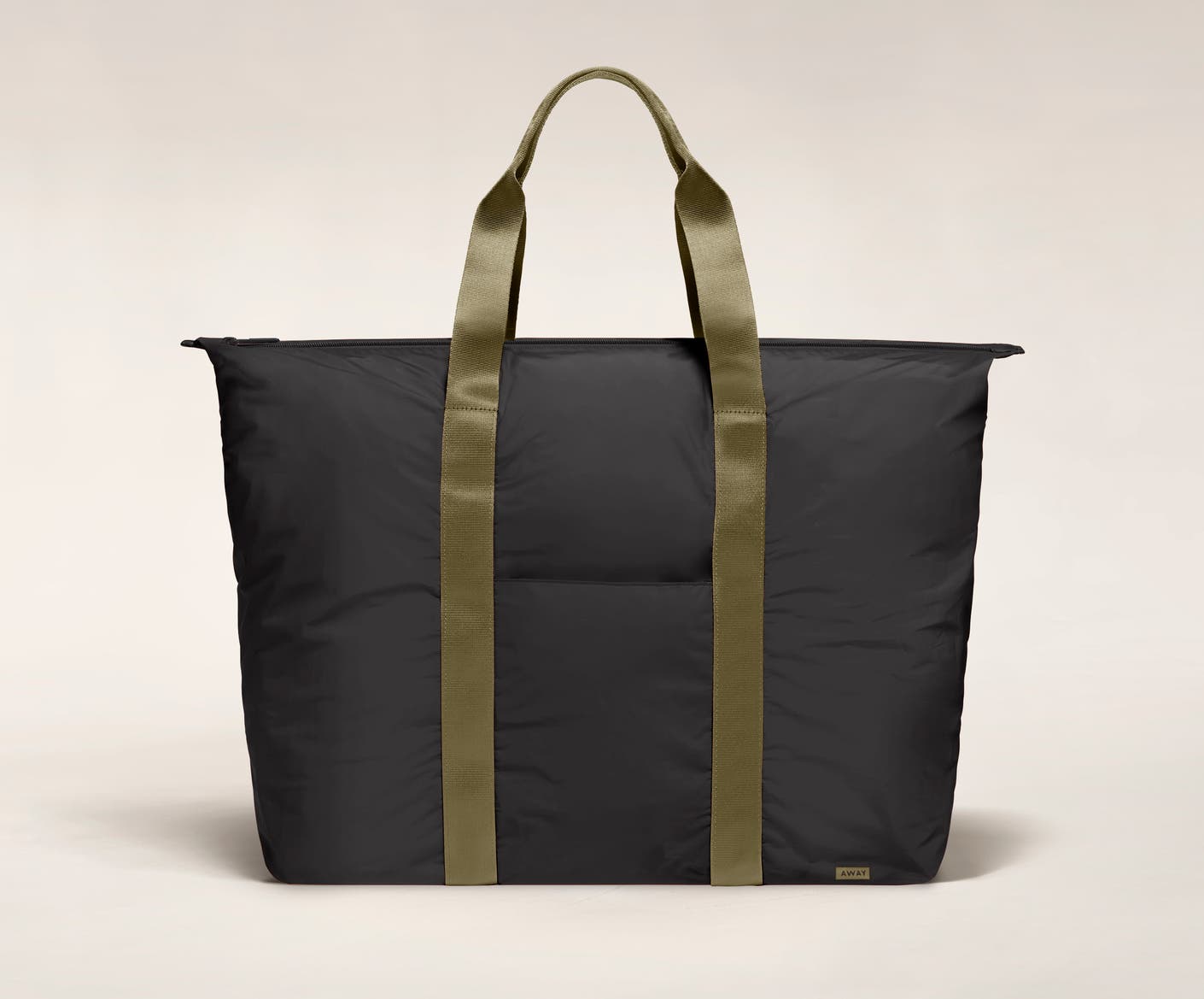 Front view of the Away packable carryall in the color black.