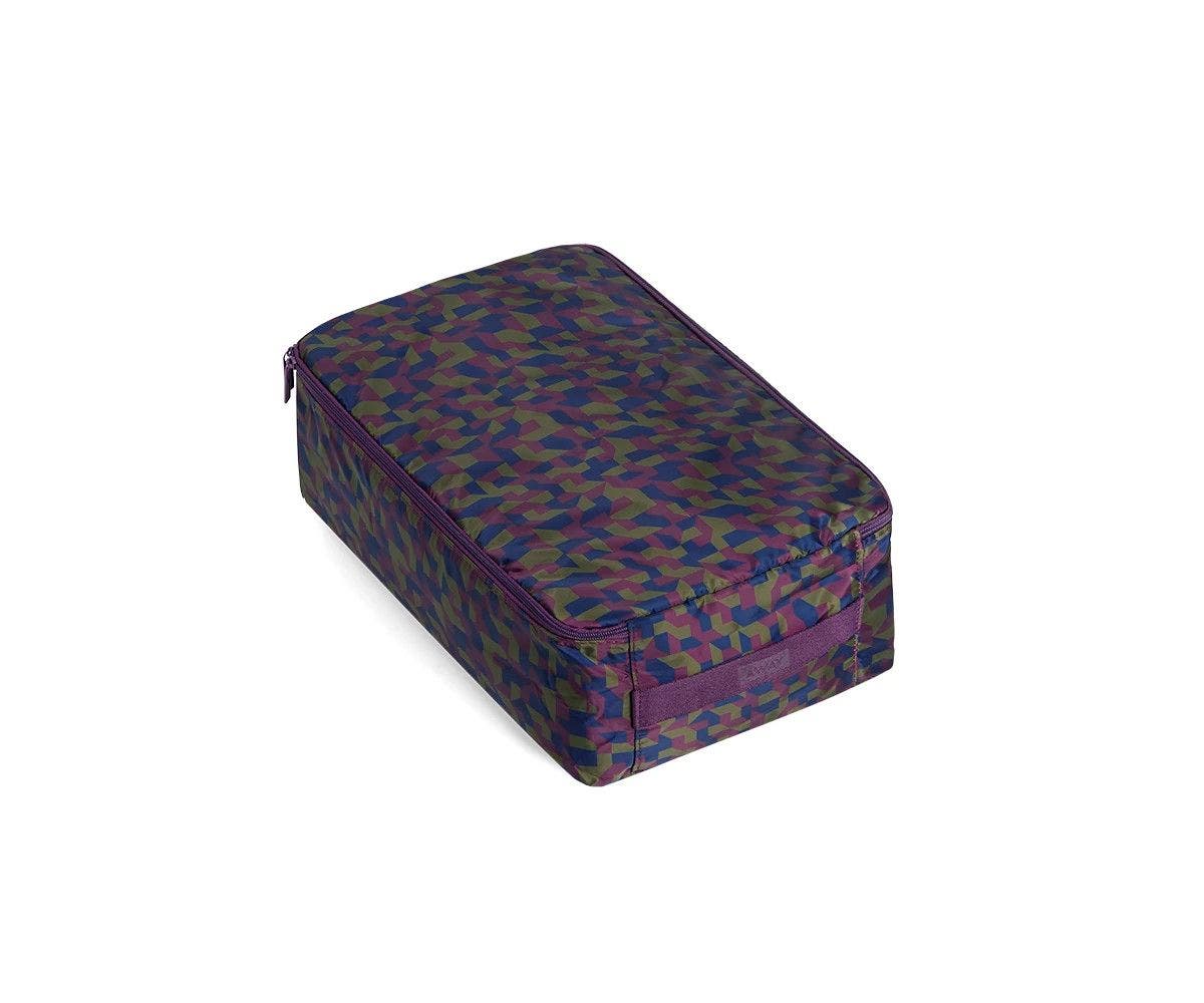 A large geometric print shoe cube