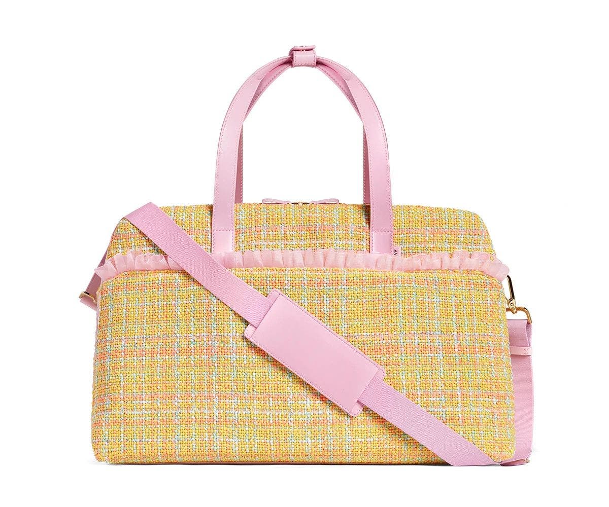 The Large Everywhere Bag by Tia Adeola in pink and yellow tweed with pink organza ruffle and a shoulder strap