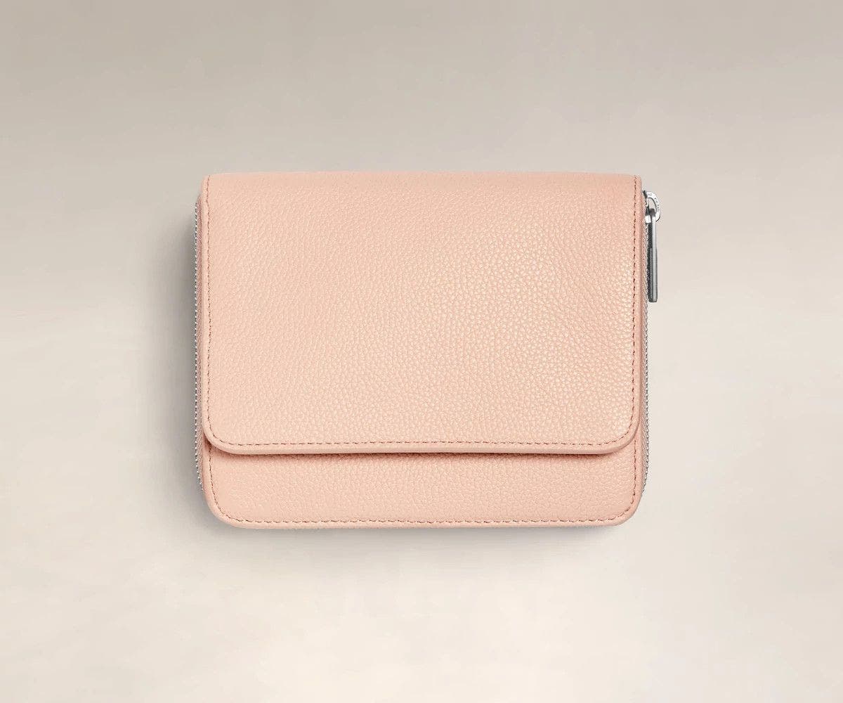 Front, closed view of the Away Jewelry Sleeve in petal pink leather