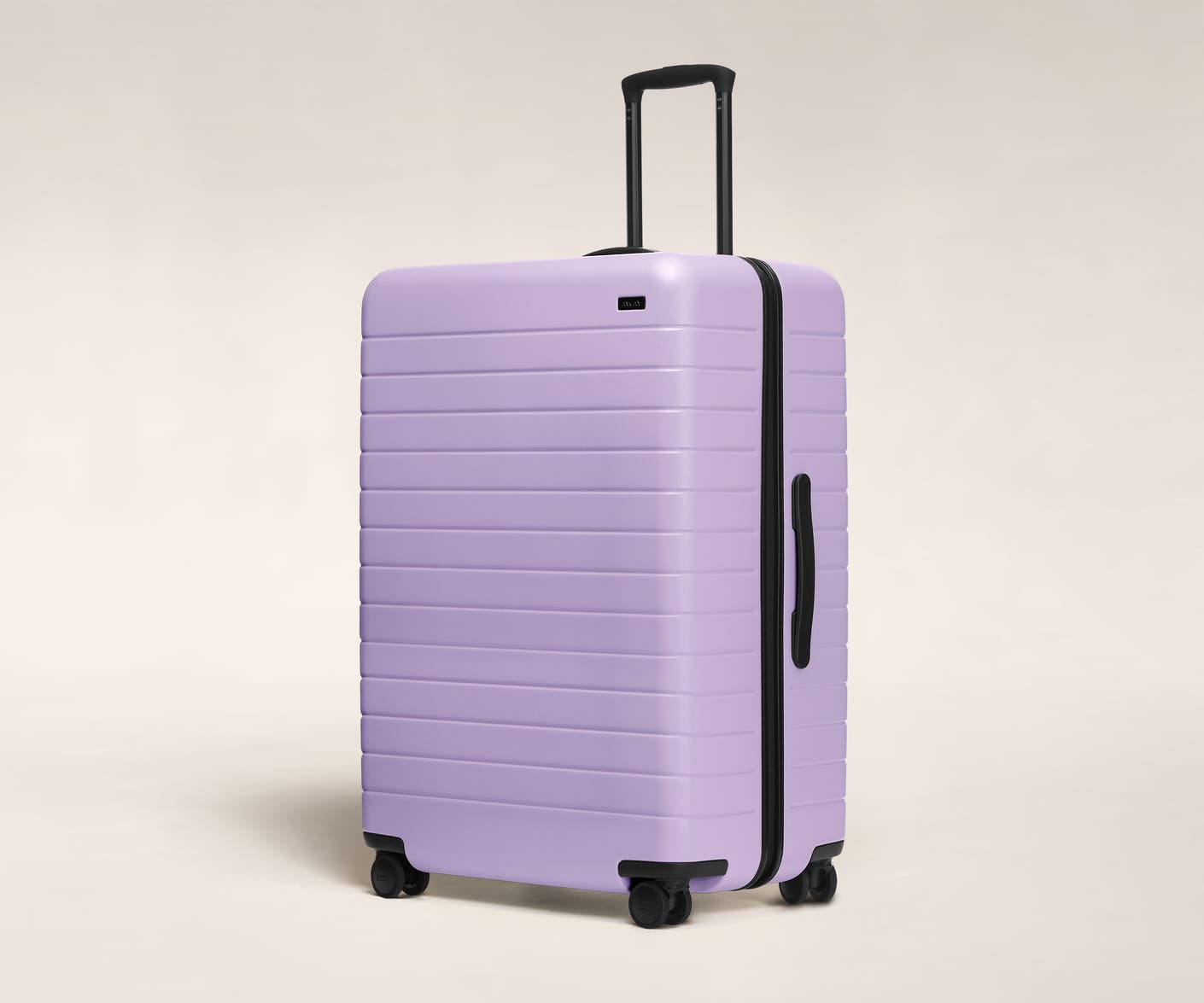 The Large in Lavender shown at an angle with raised telescoping handle