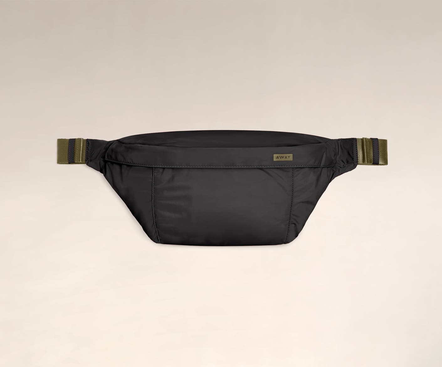 Front view of the Away packable sling bag in the color black.