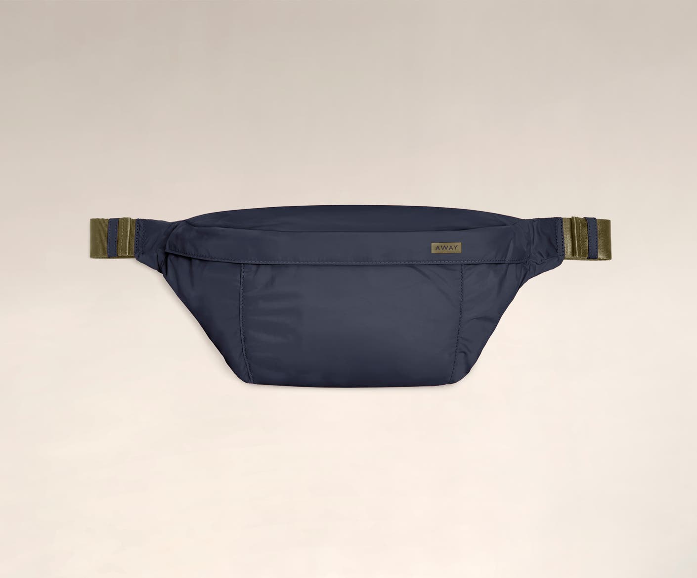 Front view of the Away packable sling bag in the color navy.