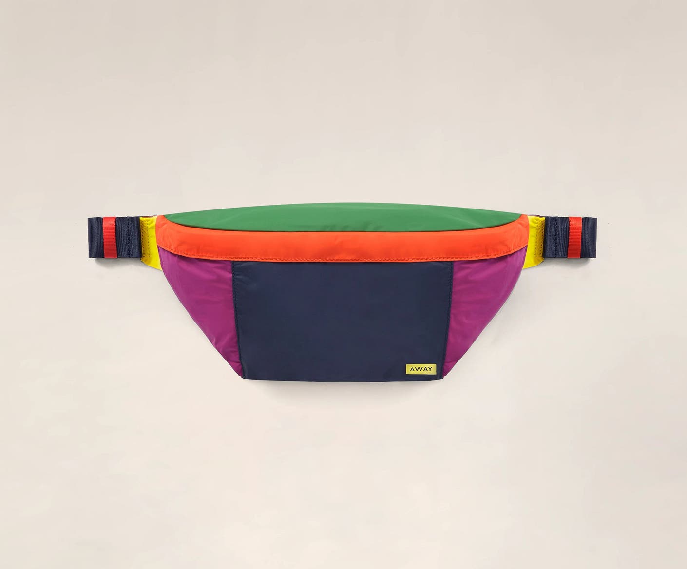 Front view of the Away packable sling bag in the color Prism.