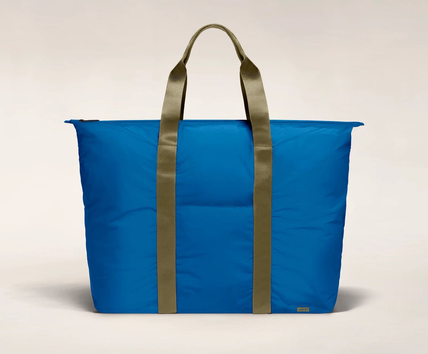 Front view of the Away packable carryall in the color pacific.