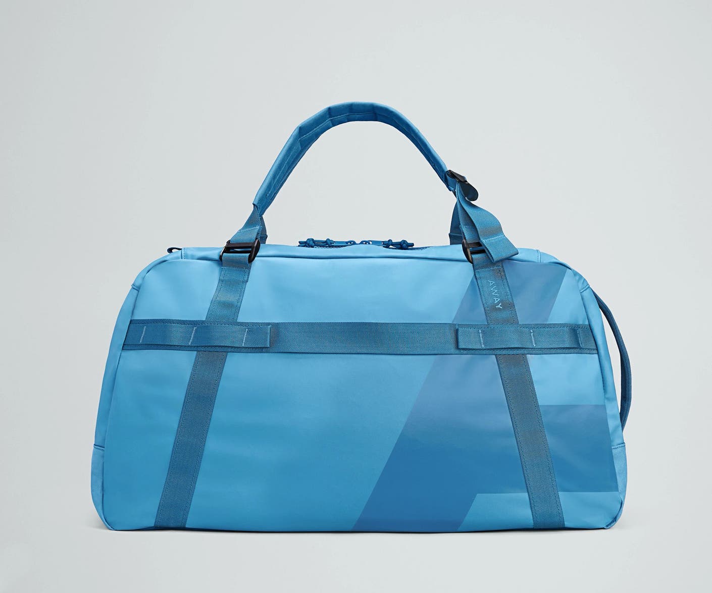 Front view of the Away For All Routes Duffle 55 Liters in bright blue
