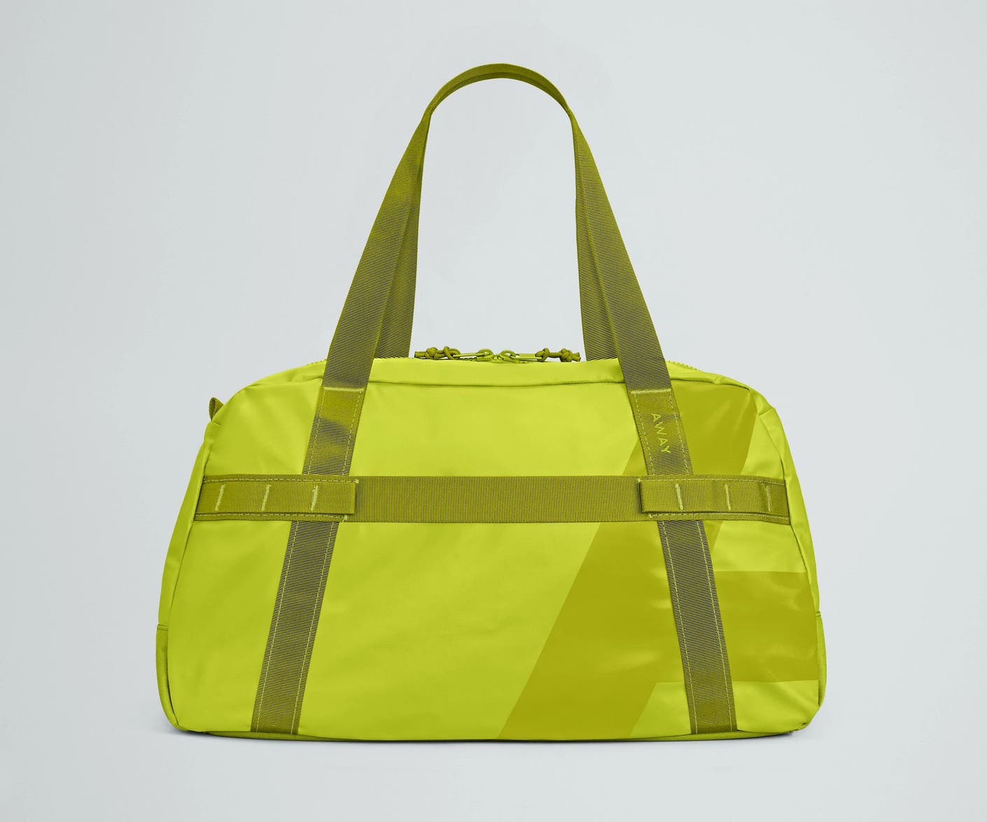 Front view of the Away For All Routes Duffle 40 liters in celery