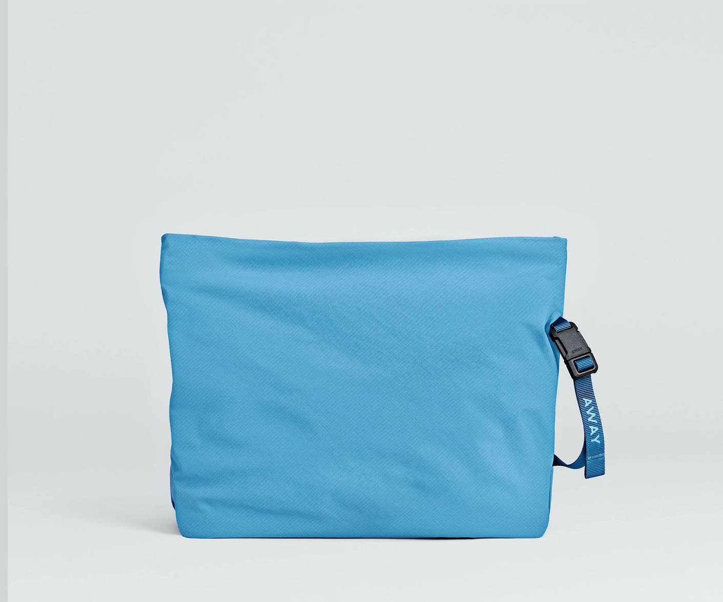 Front view of the Away For All Routes Large Pouch in blue