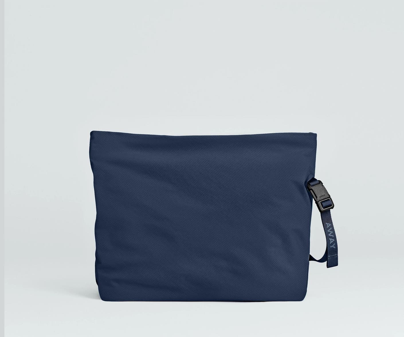 Front view of the Away For All Routes Large Pouch in navy