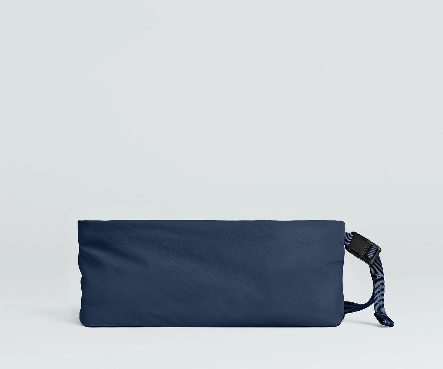 Front view of the Away For All Routes Medium Pouch in navy
