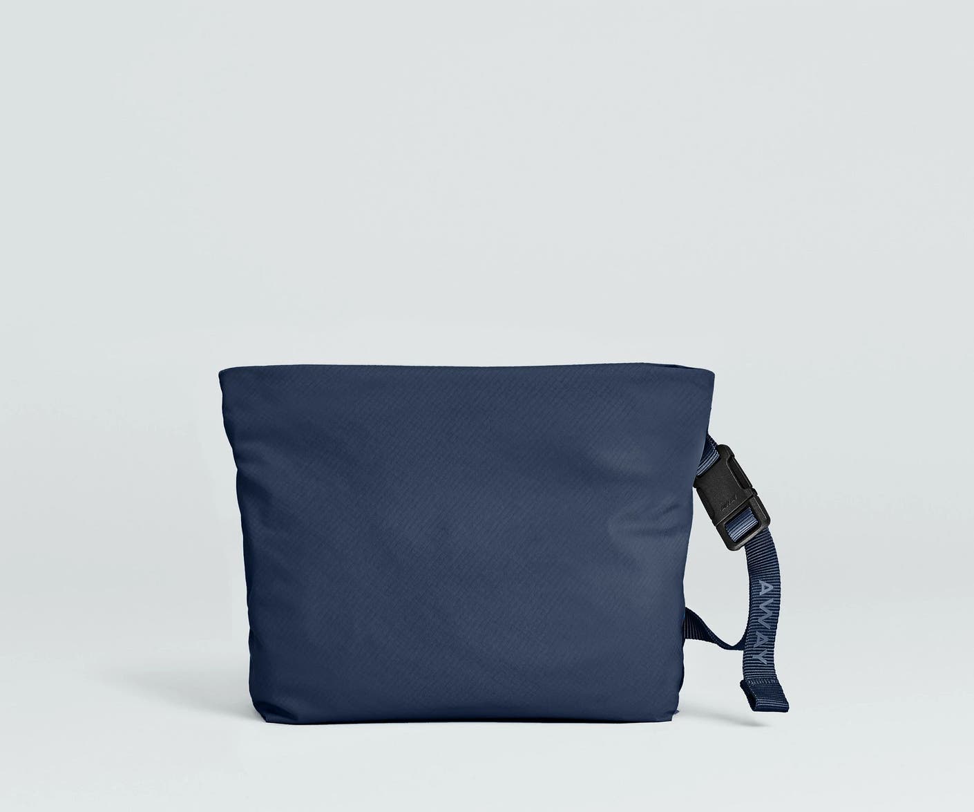 Front view of the Away For All Routes Small Pouch in navy