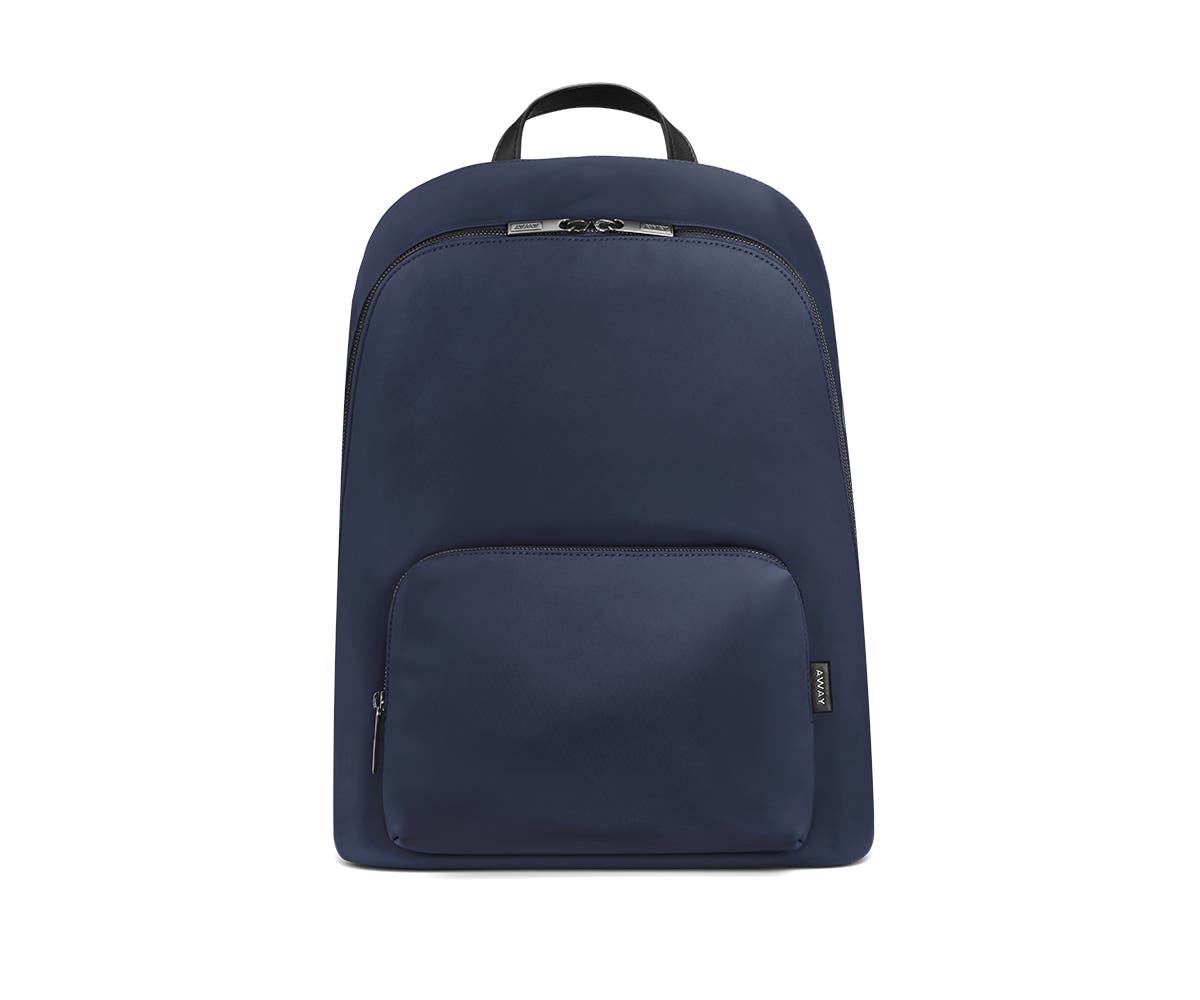 Front of a navy backpack with two pockets one main and one small with zip.