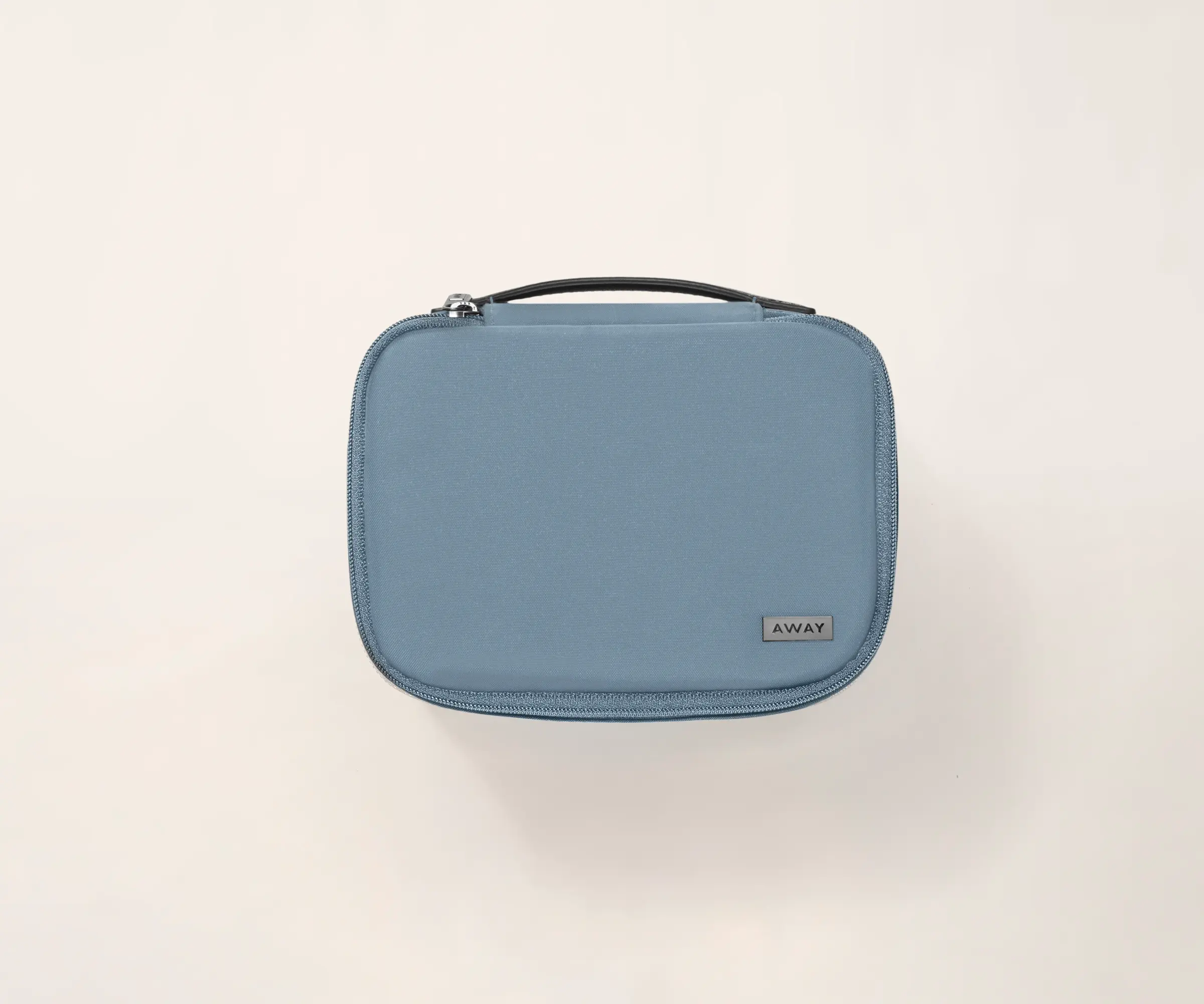 A travel tech organizer case from Away in coast.