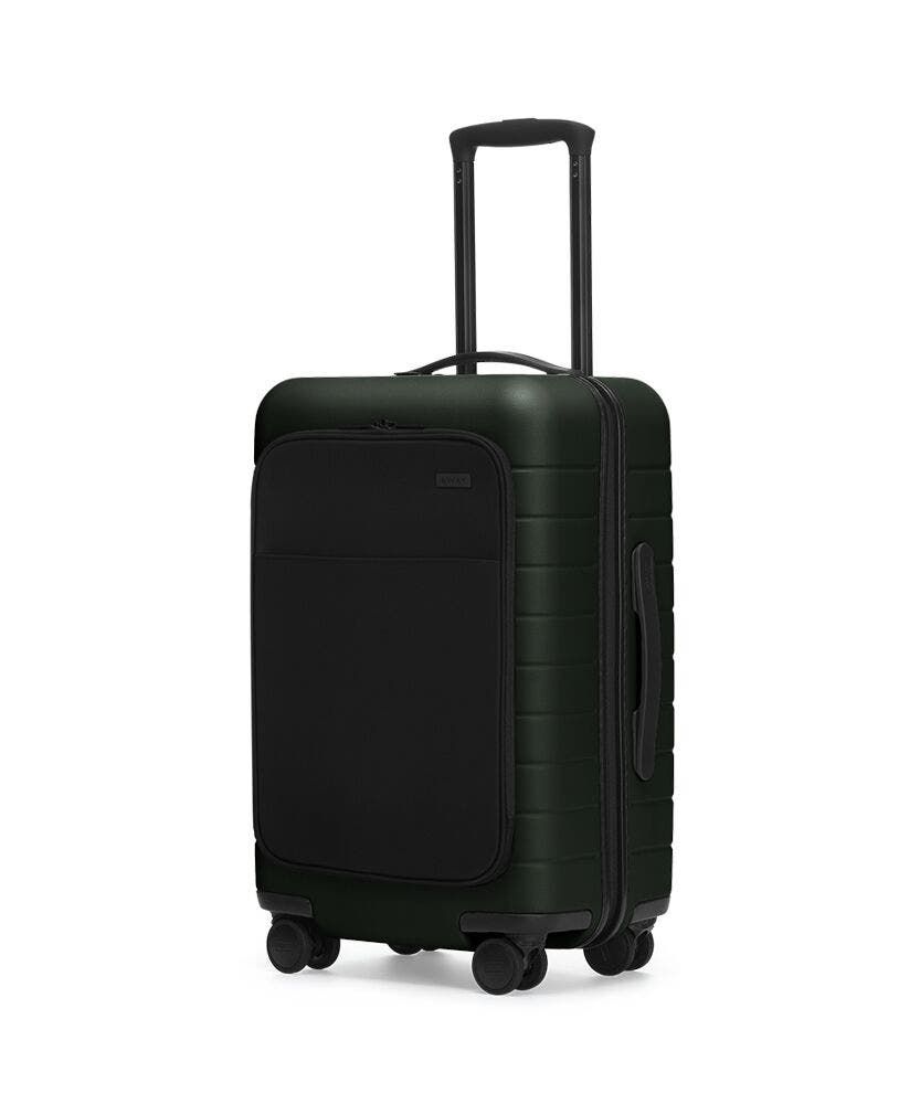 The Carry-On with Pocket in Green shown at an angle with raised telescoping handle
