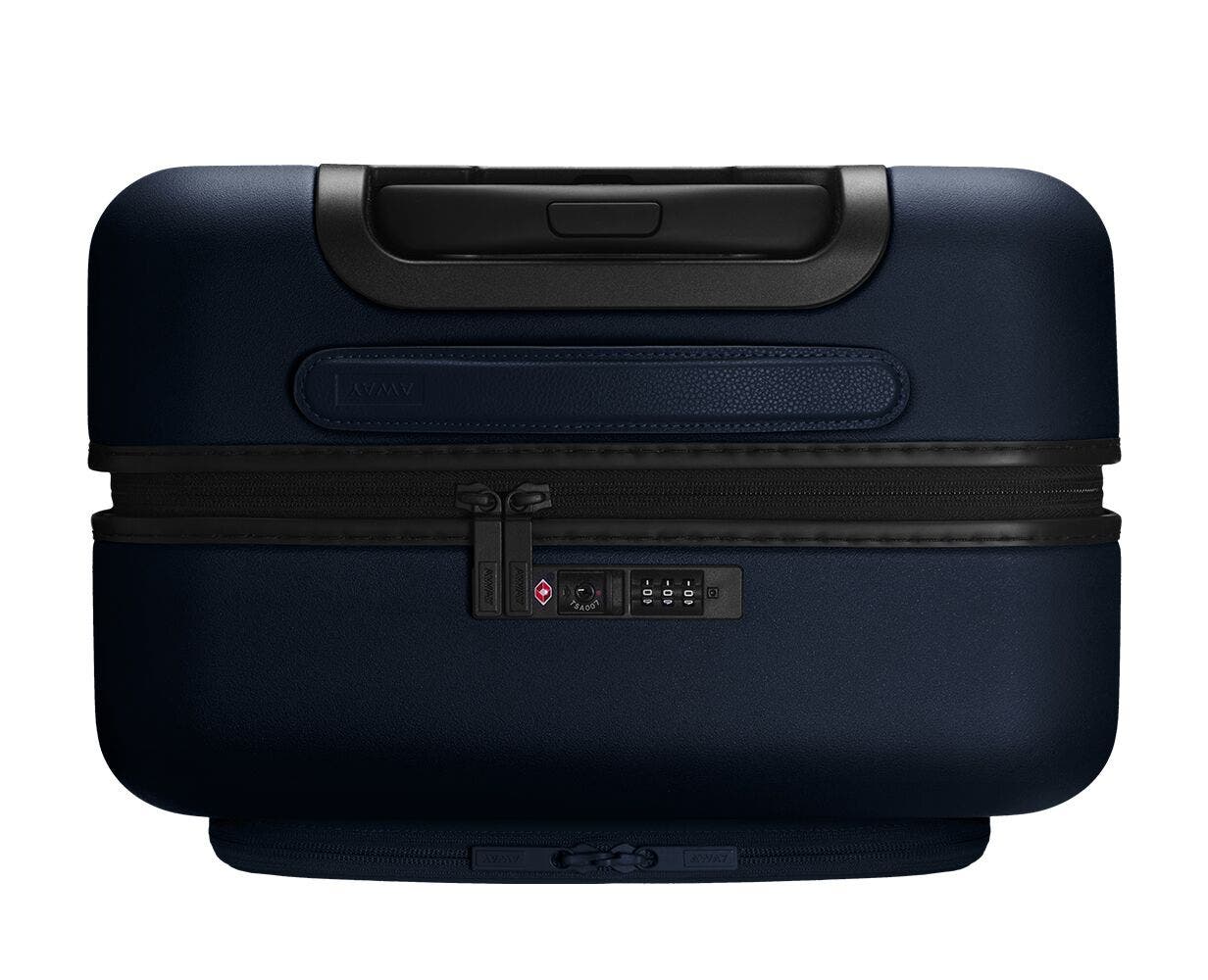 The Bigger Carry-On with Pocket in Navy showing combination lock at the top with zipper pulls secured