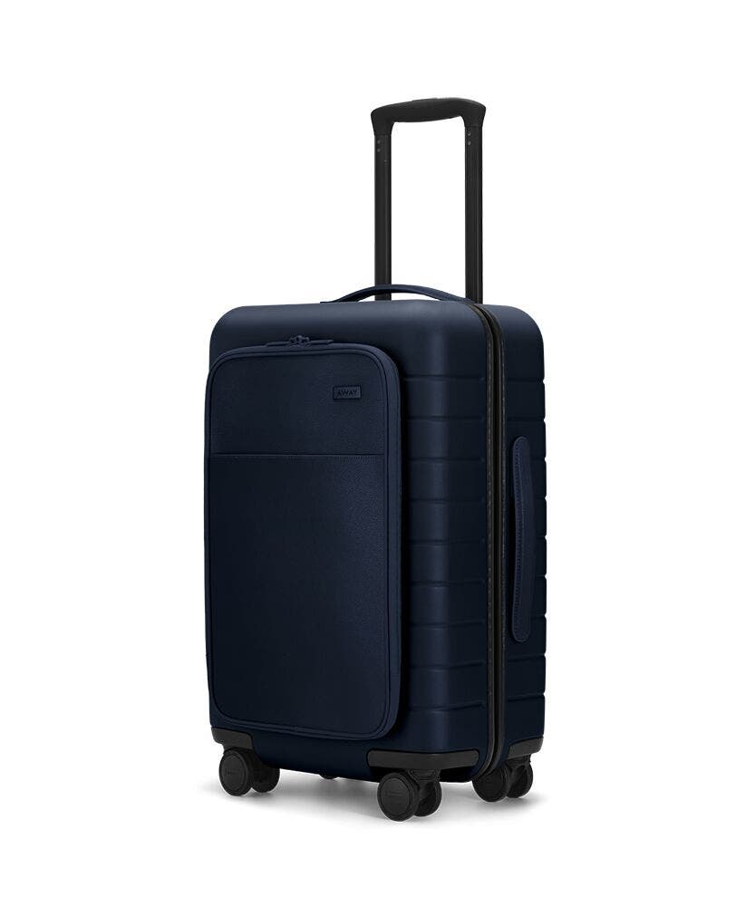 The Carry-On with Pocket in Navy shown at an angle with raised telescoping handle