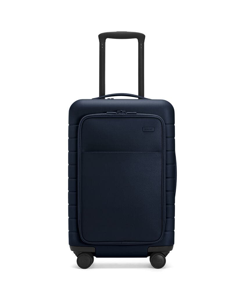 The Carry-On with Pocket in Navy shown from the front with raised telescoping handle