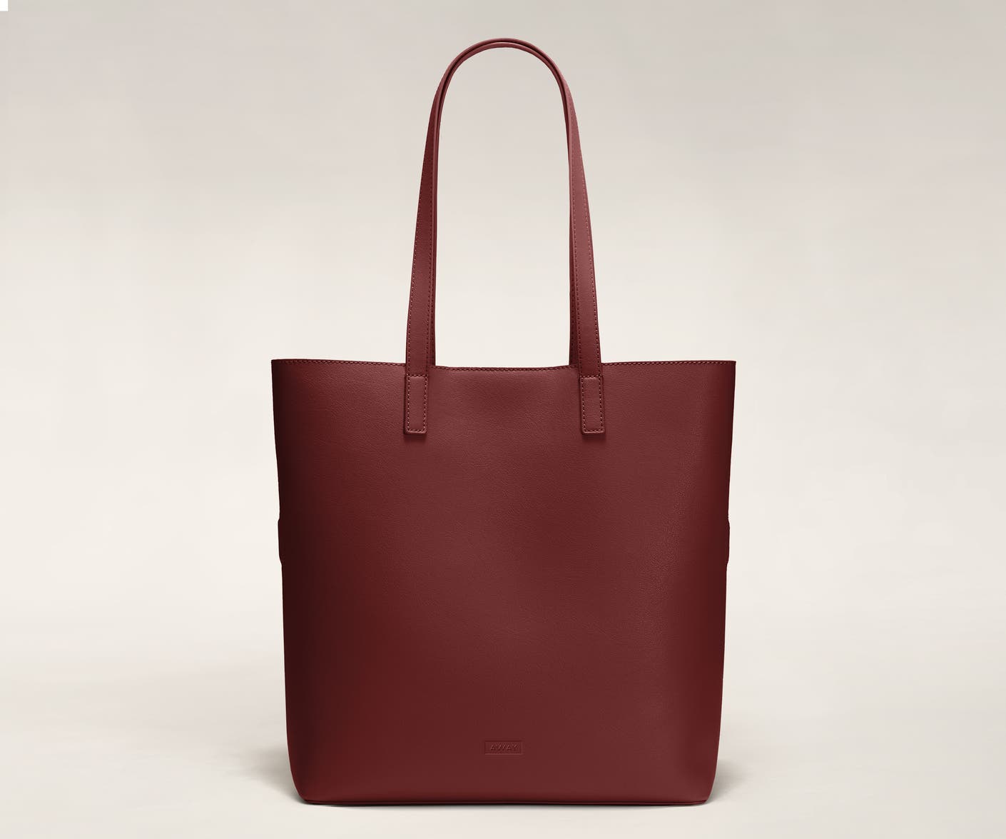The Longitude Tote in Ruby leather